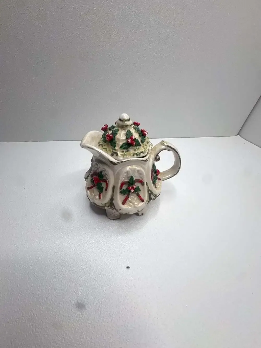 Christmas Holiday Holly and Candy Cane Embossed Ceramic Creamer with Lid